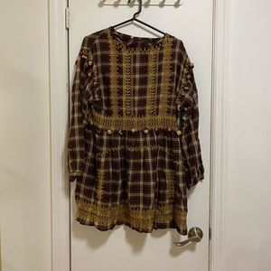 Plaid and embroidered dress with Pom poms